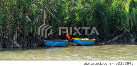 coconut river forest with basket boats, a unique Vietnamese at Cam thanh village. Landmark and popular for tourists attractions in Hoi An. Vietnam and Southeast Asia travel concepts 98338942