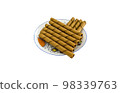Chocolate or coffee flavored wafers rolls on white dish 98339763