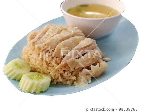Hainanese chicken rice served on a plate with soup 98339765