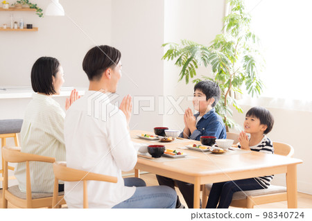 Family meal A family having an itadakimasu meal 98340724