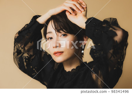A woman with short hair 98341496