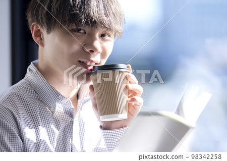 Young men reading 98342258