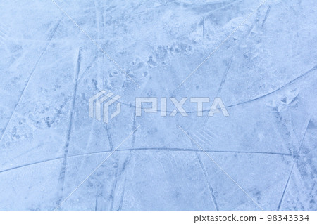 Empty ice rink with skate marks after the session outdoor. 98343334