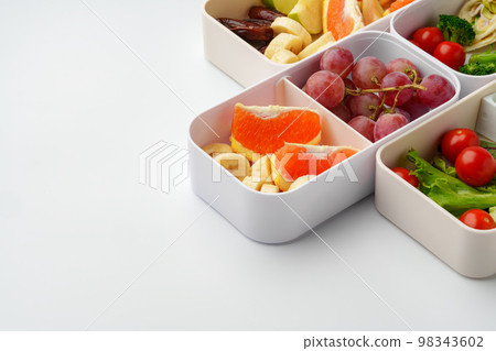 Healthy food delivery in take away box on white background 98343602