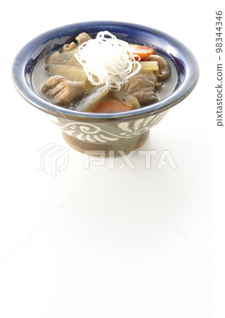 Stewed pork offal with carrot, konnyaku, burdock and radish shot on white background Stewed pork offal with carrot, konnyaku, burdock and radish shot on white background 98344346