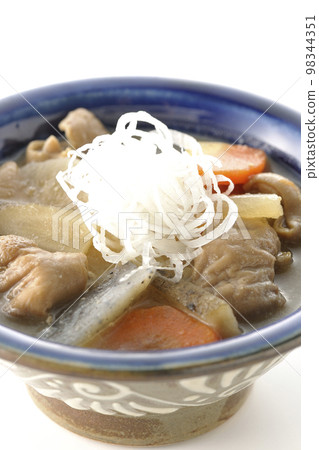 Stewed pork offal with carrot, konnyaku, burdock and radish shot on white background Stewed pork offal with carrot, konnyaku, burdock and radish shot on white background 98344351