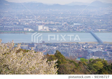 Tokushima City View of Yoshinogawa Bridge area from Mt. Bizan with cherry blossoms Tokushima City View of Yoshinogawa Bridge area from Mt. Bizan with cherry blossoms 98346727