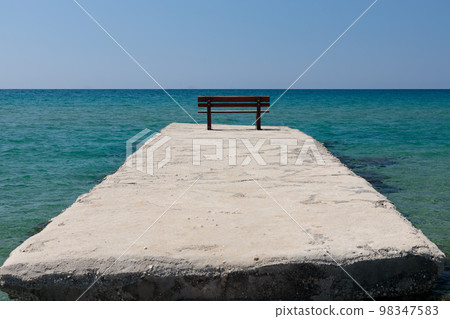 Pier with sea background on maldivian island, copy space. Pier with sea background on maldivian island, copy space. 98347583