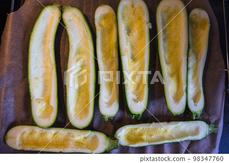 before baked zucchini with ham and vegetables, under cheese 98347760