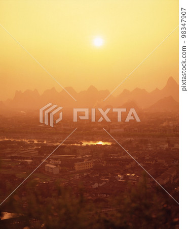 Guilin city and strange peaks seen from Qixing Park Guilin city and strange peaks seen from Qixing Park 98347907
