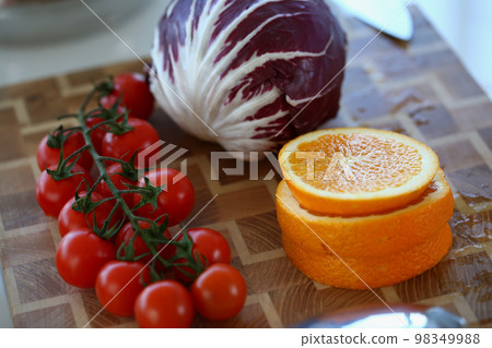 Set of vegetables and fruits on cutting board Set of vegetables and fruits on cutting board 98349988