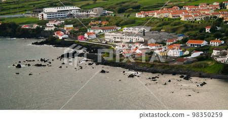 Sanset view to Porto Pim Bay from mount Guia at Faial island, Azores, Portugal Sanset view to Porto Pim Bay from mount Guia at Faial island, Azores, Portugal 98350259