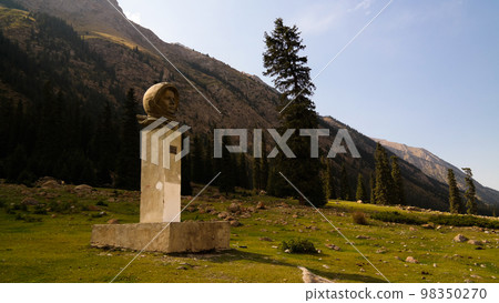 bust of Yuri Gagarin, first russian Cosmonaut, at the Barskoon canyon, Issyk-Kul, Kyrgyzstan 98350270