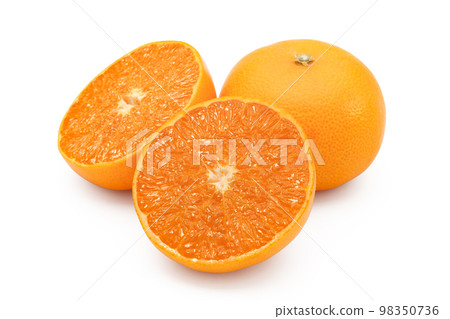 Sliced mandarin oranges on a white background Sliced mandarin oranges on a white background 98350736