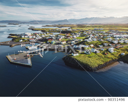 Aerial view of typical fishing village Stykkisholmskirkja Harbor in western Iceland in autumn 2022 Aerial view of typical fishing village Stykkisholmskirkja Harbor in western Iceland in autumn 2022 98351496