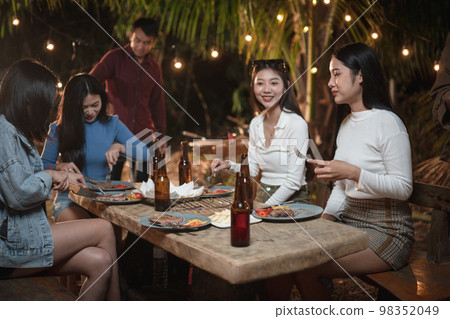 Group of young people having fun joining the party 98352049