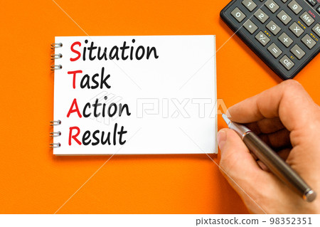 STAR situation task action result symbol. Concept words STAR situation task action result on white note on beautiful orange background. Business STAR situation task action result concept. Copy space STAR situation task action result symbol. Concept words STAR situation task action result on white note on beautiful orange background. Business STAR situation task action result concept. Copy space 98352351