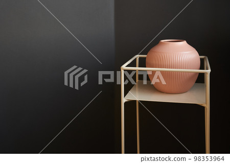 Abstract round pink figure, minimalistic stage with podium and vase. Design for a branded product with a copy space. High quality photo Abstract round pink figure, minimalistic stage with podium and vase. Design for a branded product with a copy space. High quality photo 98353964
