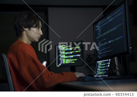 A young engineer working in the office at night Profile A young engineer working in the office at night Profile 98354413