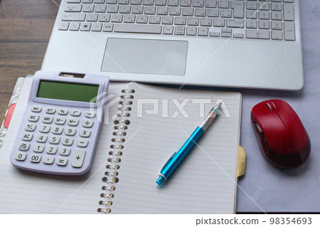 Saving image of keeping a household account book on a computer indoors 98354693