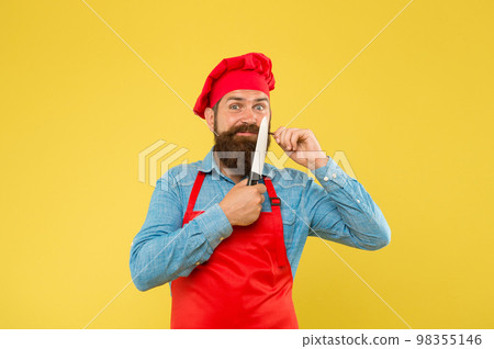 great food and service. brutal butcher in apron. best menu offer. confident bearded happy chef red uniform. Male chef cut with knife. mature hipster with happy face. satisfied bearded chef 98355146