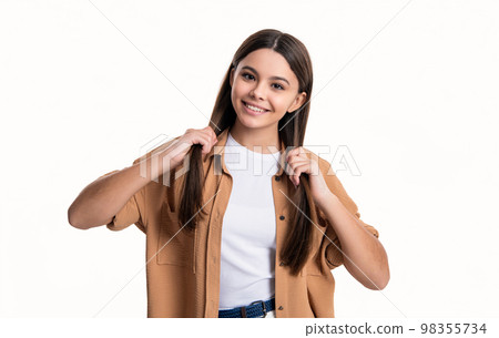 positive trendy teen girl isolated on white background. style of trendy teen girl in studio. 98355734