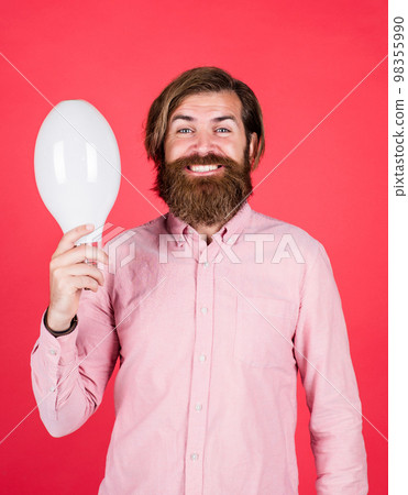 smiling man hold big lamp. got new idea. concept of creativity. man just inspired. economy of electricity. bright minded hipster. creative inspiration. light your way. bearded man with bulb 98355990
