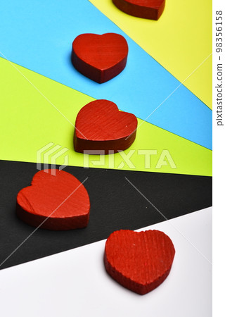 Valentine card with heart shaped wooden pieces Valentine card with heart shaped wooden pieces 98356158