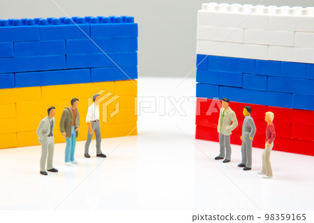 Miniature people. National Ukrainian and Russian flag from colored blocks constructor 98359165