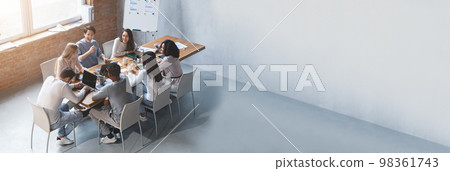 Wide Horizontal Banner With Multiethnic Business Team Discussing New Project In Office 98361743