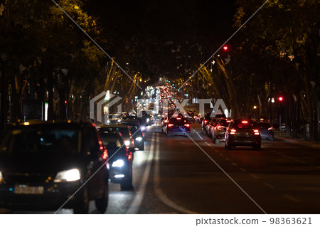 Cars stand in traffic jam on the road at night Cars stand in traffic jam on the road at night 98363621