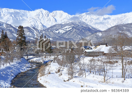 Hakuba's winter sunny Oide Park and the Northern Alps 98364389