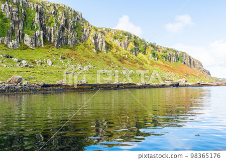 Mountainous landscape on the Isle of Skye coast in Scotland. 98365176
