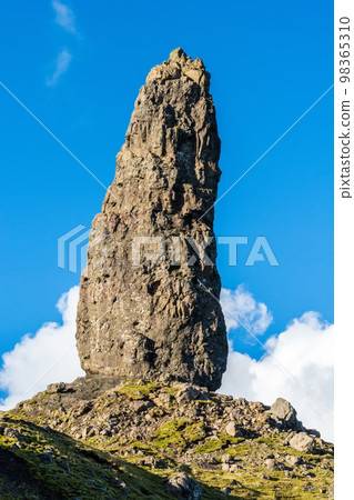 A rocky pinnacle of the Old Man of Storr cliffs in the Isle of Skye in Scotland. 98365310