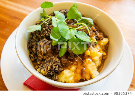 Modern take on haggis, tatties and neeps in Scotland. Modern take on haggis, tatties and neeps in Scotland. 98365374