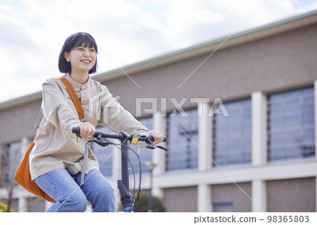 Japanese university students enjoying campus life Japanese university students enjoying campus life 98365803