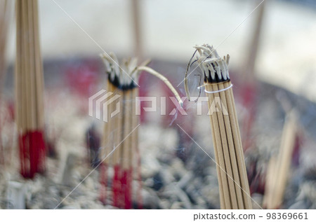 Burning incense sticks. Incense for praying Buddha or Hindu gods to show worship. bless the holy Burning incense sticks. Incense for praying Buddha or Hindu gods to show worship. bless the holy 98369661