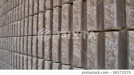 Sturdy beige and gray cut stone wall, seamless lined up Sturdy beige and gray cut stone wall, seamless lined up 98372078