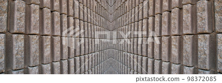 Sturdy beige and gray cut stone wall, seamless lined up 98372085