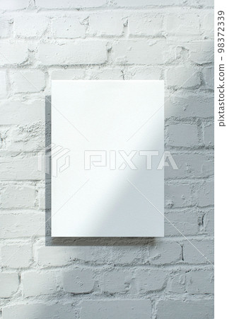 Paper mock-up on white brick background Paper mock-up on white brick background 98372339