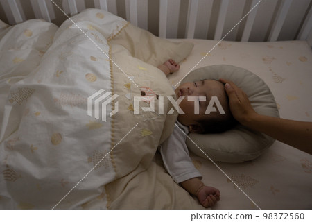 A baby sleeping in Nentre at night A baby sleeping in Nentre at night 98372560