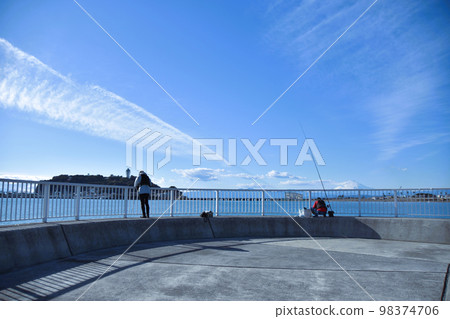 Kamakura City Koshigoe Fishing Port Enoshima and Mt.Fuji in snow Kamakura City Koshigoe Fishing Port Enoshima and Mt.Fuji in snow 98374706