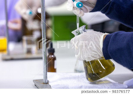 Biological Oxygen Demand (BOD) testing process in laboratory. 98376577