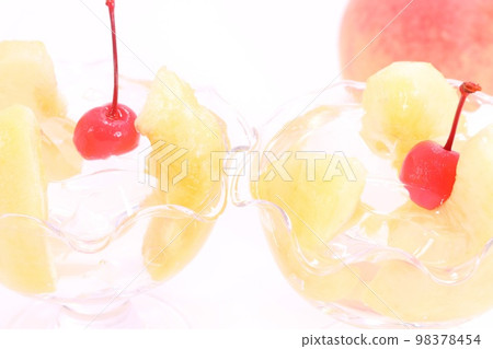 Peach jelly dessert peach bright background 98378454