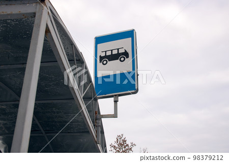 Road sign bus stop on sky background 98379212