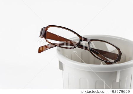 Eyeglasses in the trash can. Image of vision recovery 98379699