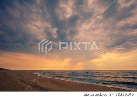 Seascape, sunset over the sea. Atlantic ocean in the evening. Beautiful nature Seascape, sunset over the sea. Atlantic ocean in the evening. Beautiful nature 98380149