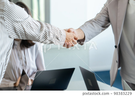 Business scene handshake hand 98383229