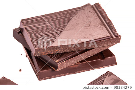 Close up pieces of chocolate on a white background, dessert isolated, health concept Close up pieces of chocolate on a white background, dessert isolated, health concept 98384279