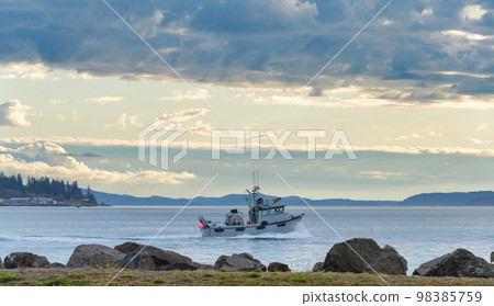 Small trawler is going to the fishing reid in Pacific ocean Small trawler is going to the fishing reid in Pacific ocean 98385759